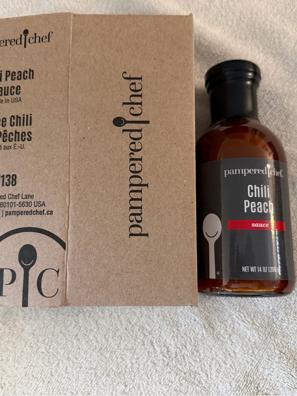 The Pampered Chef Chili Peach Sauce Bottle - Black, Red, Brown